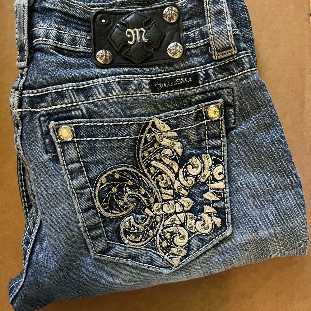 Miss Me distressed, low rise, boot cut, Denim Jeans with Fleur-de-Lis Embroidery